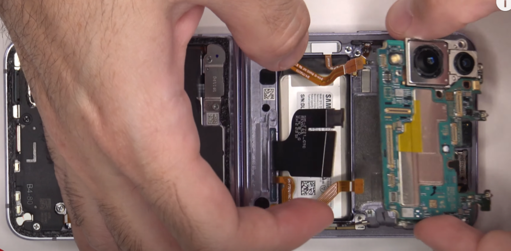 Pulling out Motherboard of Samsung Galaxy Z Flip 4 